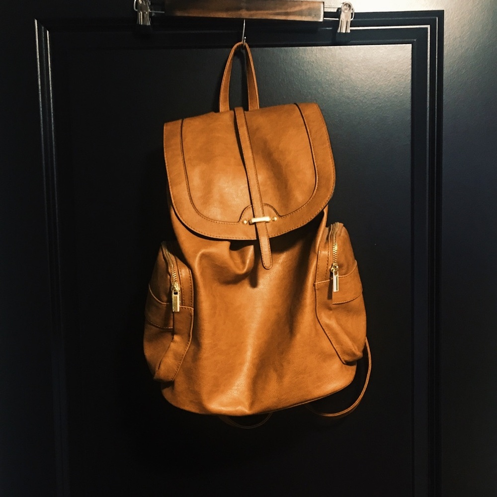Light Brown Leather Backpack with Gold Accents